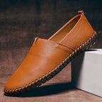 Mocassins de pele cosidos à mão
