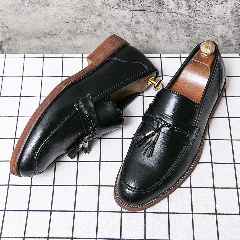 Mocassins de Pele com Borlas