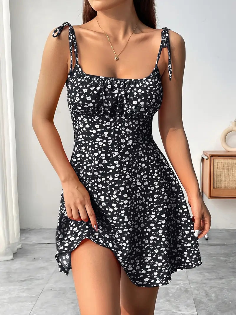 Vestido mini floral para mulher com alças amarradas e bainha evasê